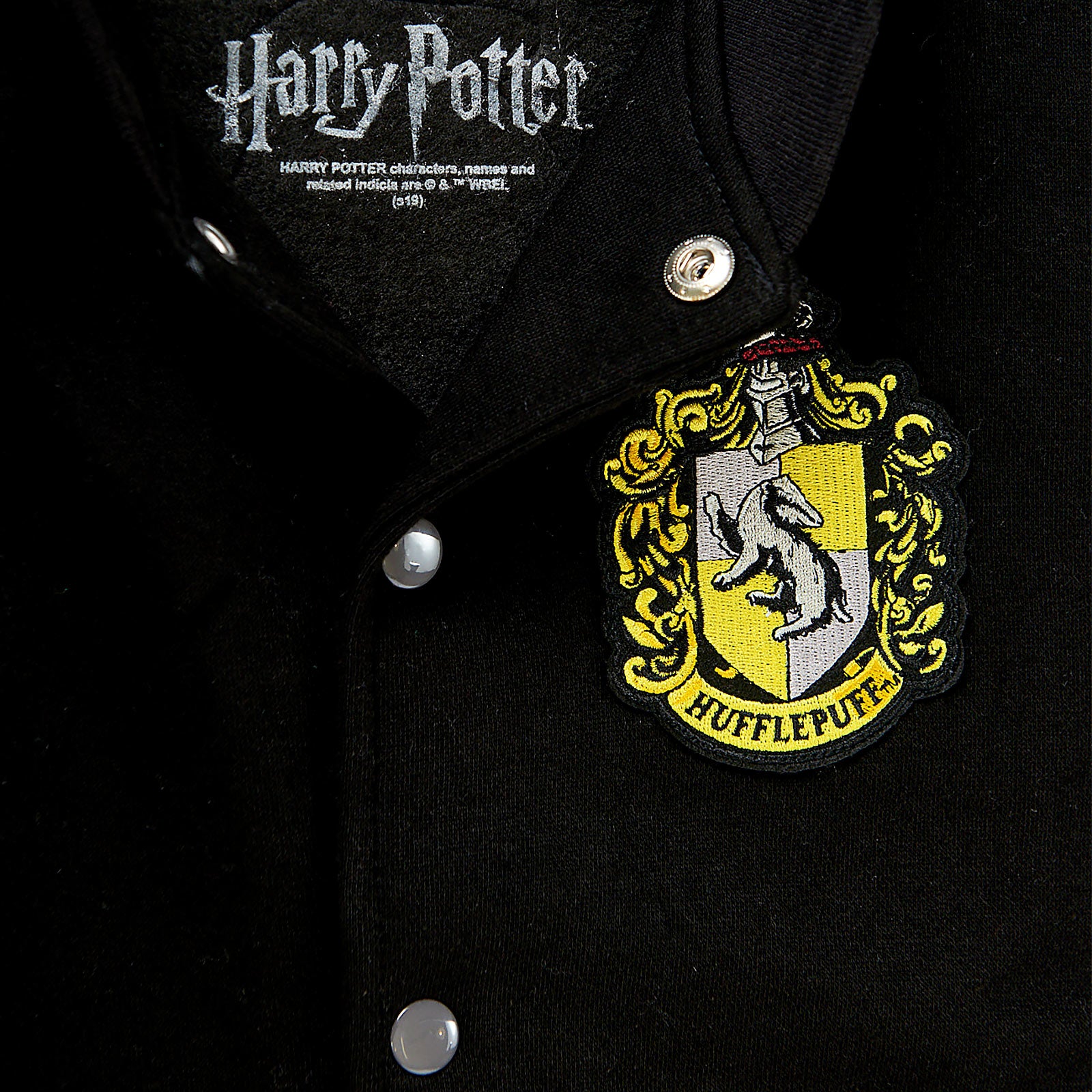 Produktbild Harry Potter - Hufflepuff-emblem Collegejacka