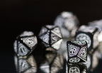 Product image Witcher - Yennefer Obsidian Star RPG Dice Set 7pcs with Collector's Coin
