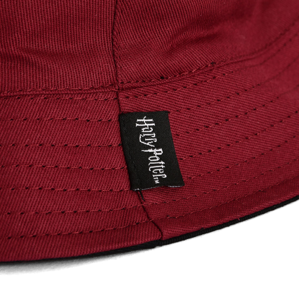Produktbild Gryffindor-emblem hatt med vändbart motiv - Harry Potter