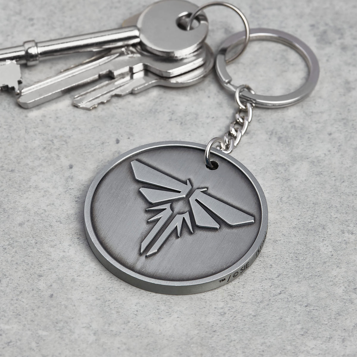 Produktbild The Last of Us - Firefly nyckelring