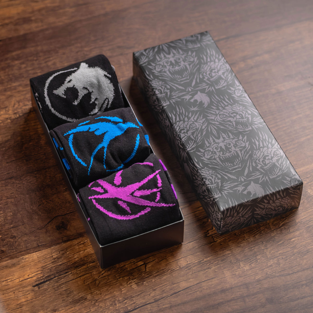 Produktbild The Witcher - Symbols strumpor 3-pack i presentförpackning