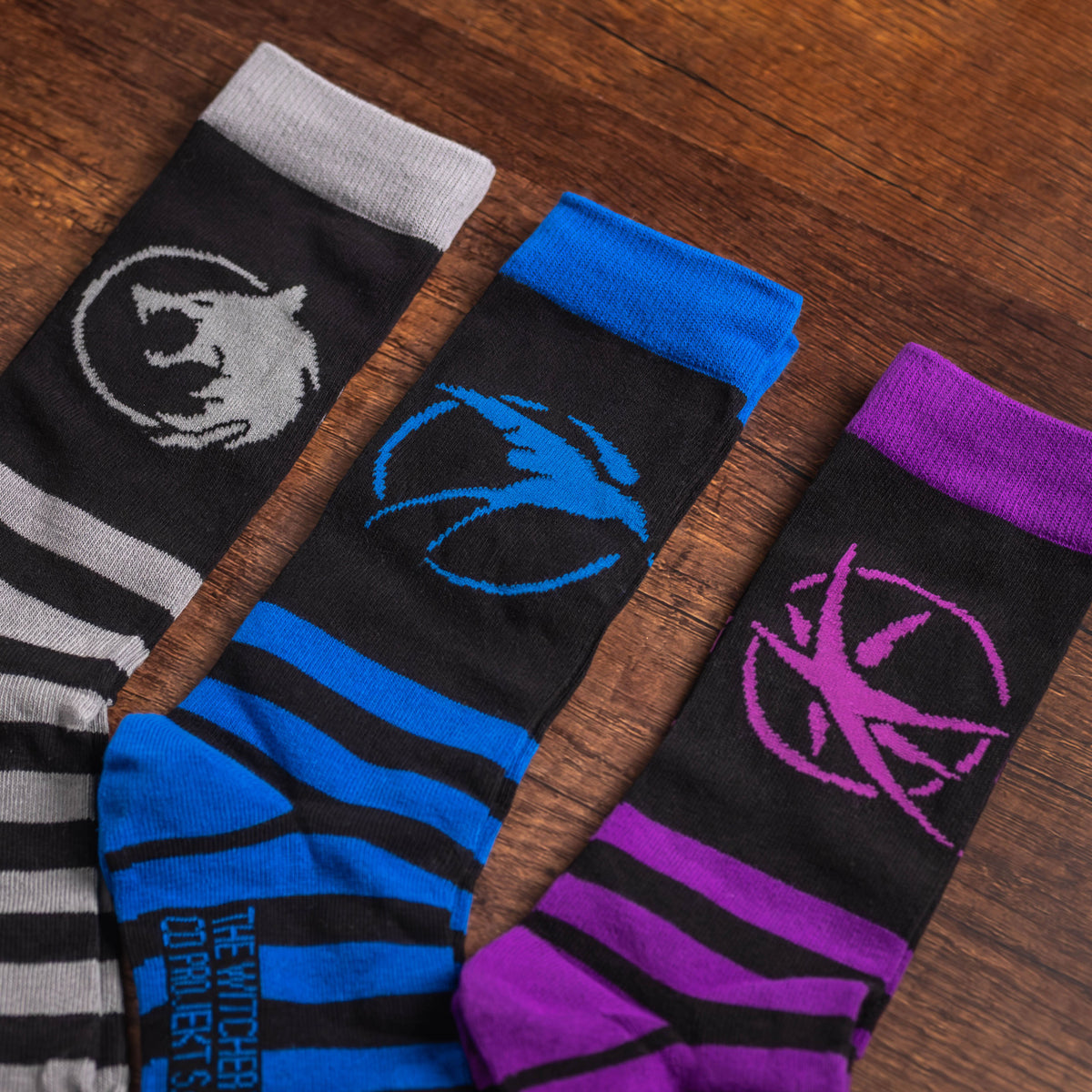 Produktbild The Witcher - Symbols strumpor 3-pack i presentförpackning