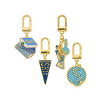 Produktbild Wicked - Welcome to Shiz resväska med charm-armband