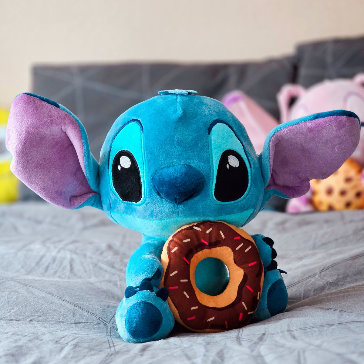 Produktbild Lilo & Stitch plyschfigur Stitch med munk 25 cm