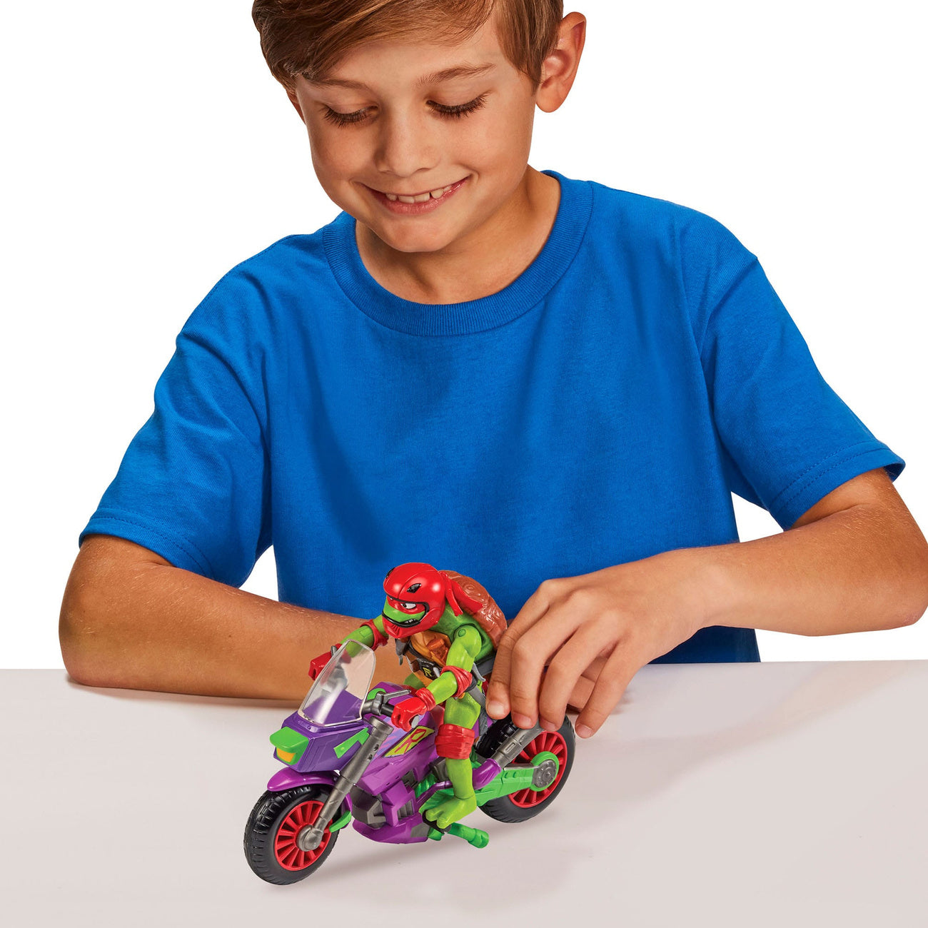 Produktbild Teenage Mutant Ninja Turtles Äventyr – Actionfigur med fordon Raphael & Purple Dragon 12 cm